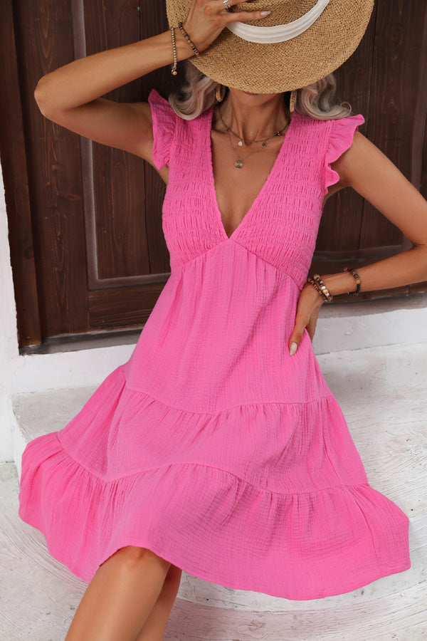 667_e71c71e6-1428-4942-a084-5af70c5f91dd.jpg V Neck Solid Smocked Ruffle Hem Mini Dress - Image 1