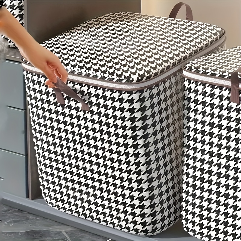 f3f5851f1c5b42630dce21937aeabe22.jpg 1pc Clothes Storage Bag, Houndstooth Pattern Folding Fabric Storage Bag, Large Capacity Waterproof Moisture-proof Cotton Quilt Storage Bag, Home Organization And Storage - Image 1